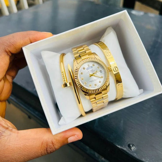 Superb Deal For Women's 

1 Rolex Watch 
1 Cartier Bangle
1 Stainless Bangle 

With Box